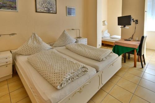 Imagen de la habitación del Hotelpension Erika. Foto 8