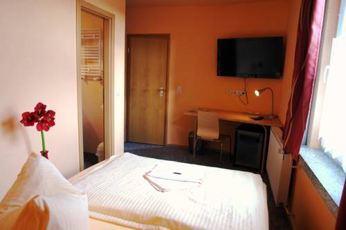 Imagen de la habitación del Hotel-pension Gr&uuml;ne Linde. Foto 9