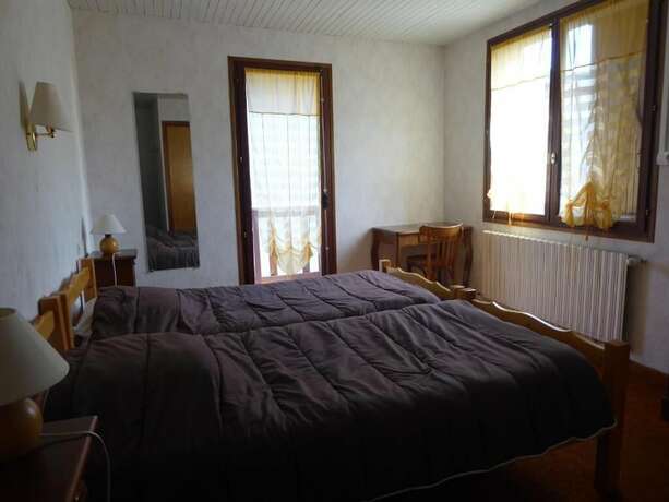 Imagen de la habitación del Hotel-restaurant Les Chenets. Foto 17