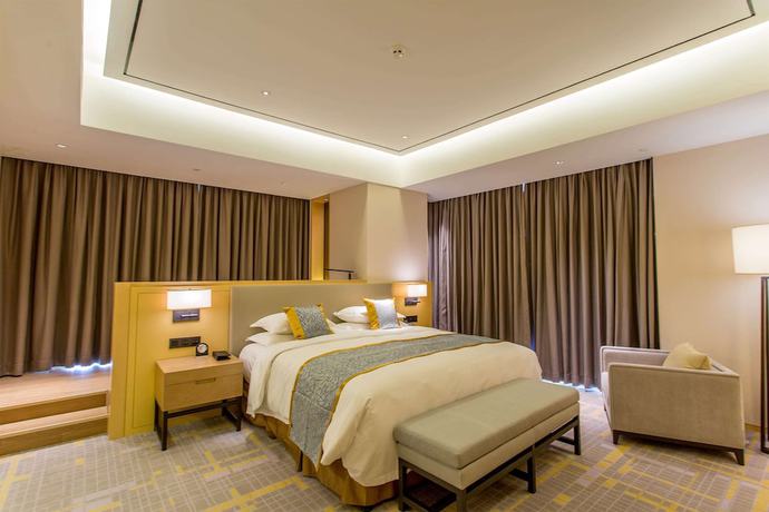 Imagen de la habitación del Howard Johnson By Wyndham Glory Plaza Chenghai. Foto 4