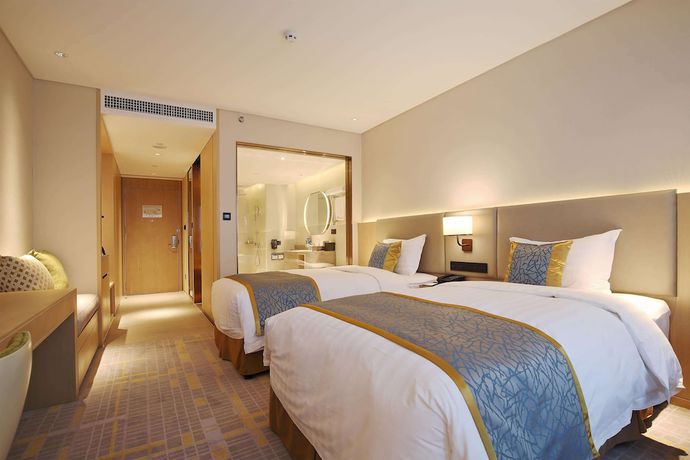 Imagen de la habitación del Howard Johnson By Wyndham Glory Plaza Chenghai. Foto 6