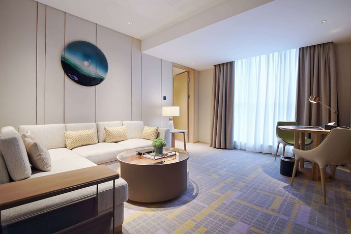 Imagen de la habitación del Howard Johnson By Wyndham Glory Plaza Chenghai. Foto 8