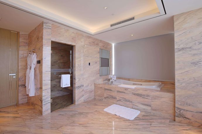 Imagen de la habitación del Howard Johnson By Wyndham Glory Plaza Chenghai. Foto 11