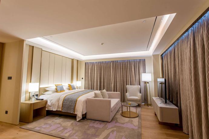 Imagen de la habitación del Howard Johnson By Wyndham Glory Plaza Chenghai. Foto 12