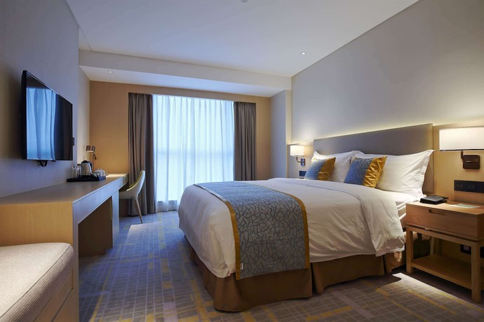 Imagen de la habitación del Howard Johnson By Wyndham Glory Plaza Chenghai. Foto 17