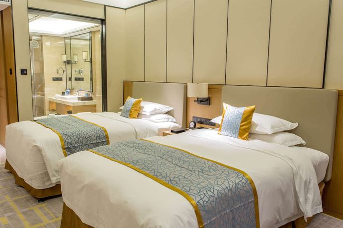 Imagen de la habitación del Howard Johnson By Wyndham Glory Plaza Chenghai. Foto 19