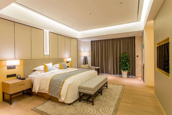 Imagen de la habitación del Howard Johnson By Wyndham Glory Plaza Chenghai. Foto 20