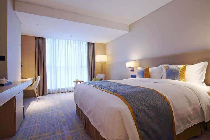 Imagen general del Howard Johnson By Wyndham Glory Plaza Chenghai. Foto 2