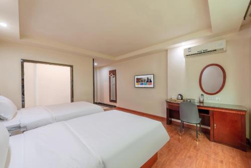 Imagen de la habitación del Huahang Hotel (Guangzhou New Baiyun International Airport). Foto 20