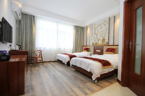 Imagen de la habitación del Huangshan Castle In The Sky Hotel. Foto 6