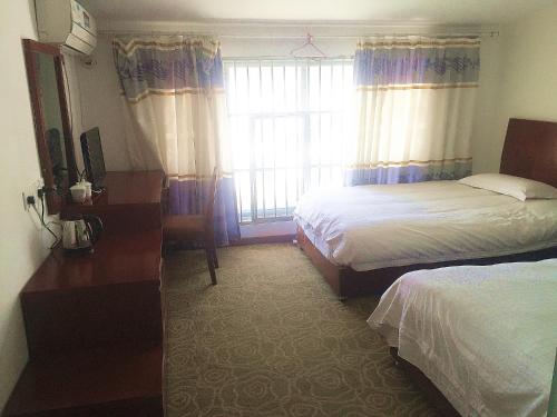 Imagen de la habitación del Huangshan Dihao Garden Hotel. Foto 6