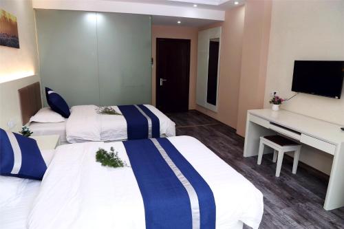 Imagen de la habitación del Huangshan Linxi First Tower Inn. Foto 7