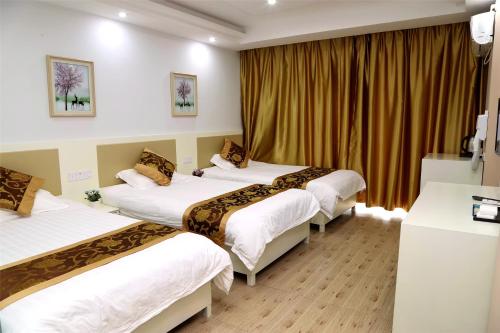 Imagen de la habitación del Huangshan Linxi First Tower Inn. Foto 8