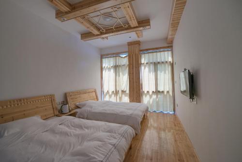 Imagen de la habitación del Huangshan Songquan Inn. Foto 6