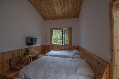 Imagen de la habitación del Huangshan Songquan Inn. Foto 9