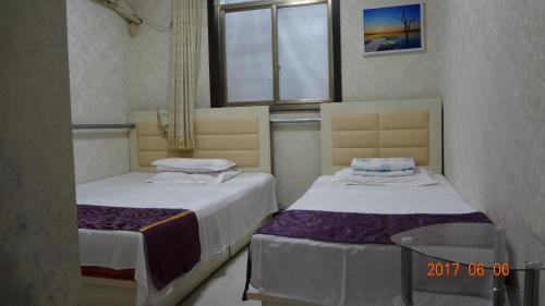 Imagen de la habitación del Huangyaguan Great Wall Li Bo Home Hotel. Foto 7