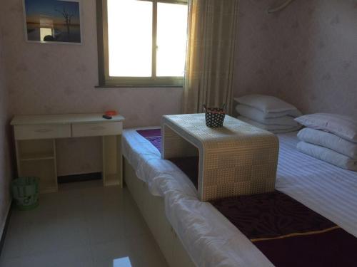 Imagen general del Huangyaguan Great Wall Li Bo Home Hotel. Foto 2