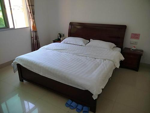 Imagen de la habitación del Huanxing Inn. Foto 7