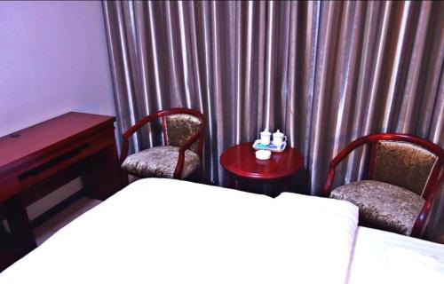 Imagen de la habitación del Huashan Wanyuan Inn. Foto 8