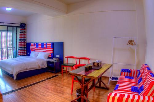 Imagen de la habitación del Hui Jin Inn Suites. Foto 6