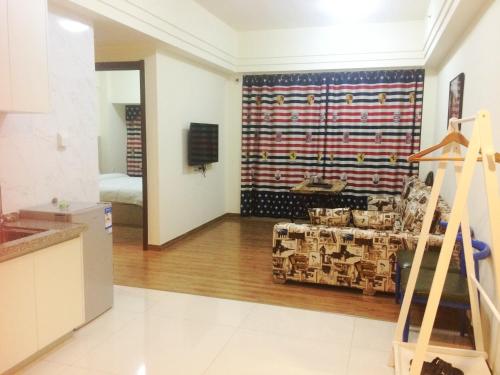 Imagen de la habitación del Hui Jin Inn Suites. Foto 8