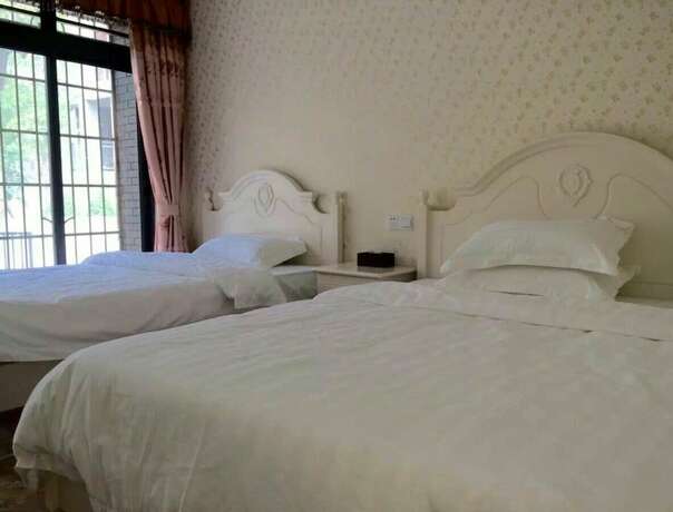 Imagen de la habitación del Hui Tong Villa. Foto 13