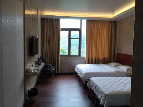 Imagen de la habitación del Huizhou Luofu Yixuan Hotel. Foto 9