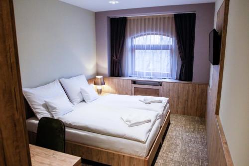 Imagen de la habitación del Hunor Hotel és Étterem. Foto 10