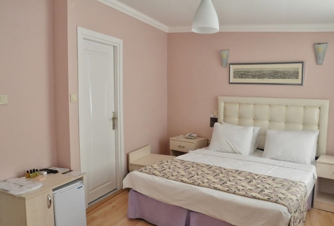 Imagen de la habitación del Huxley Hotel and Aparts Old City. Foto 3