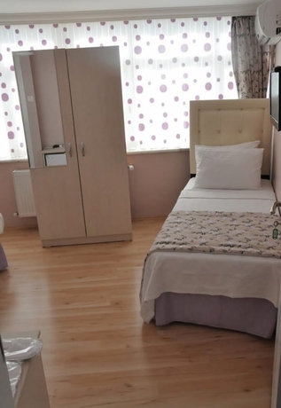 Imagen de la habitación del Huxley Hotel and Aparts Old City. Foto 4