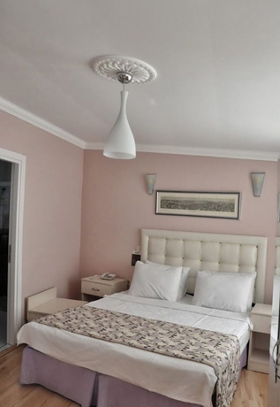 Imagen de la habitación del Huxley Hotel and Aparts Old City. Foto 6