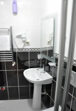 Imagen de la habitación del Huxley Hotel and Aparts Old City. Foto 16