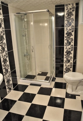 Imagen de la habitación del Huxley Hotel and Aparts Old City. Foto 17