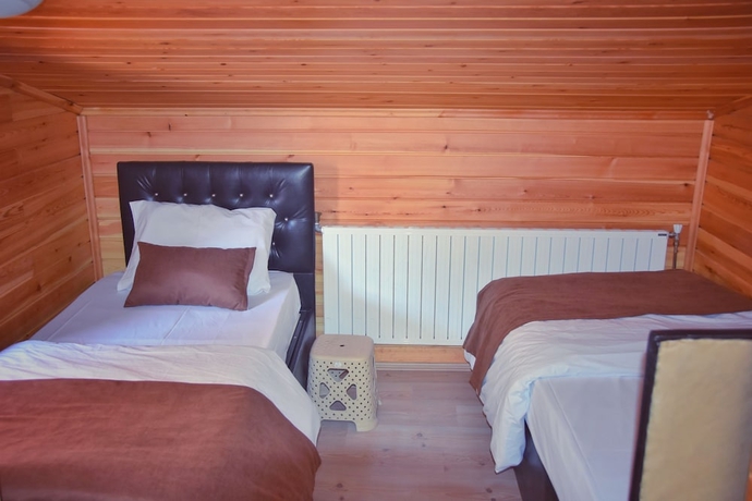 Imagen de la habitación del Huzur Otel. Foto 13