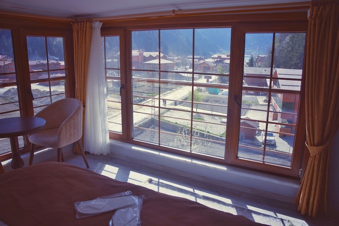 Imagen de la habitación del Huzur Otel. Foto 17