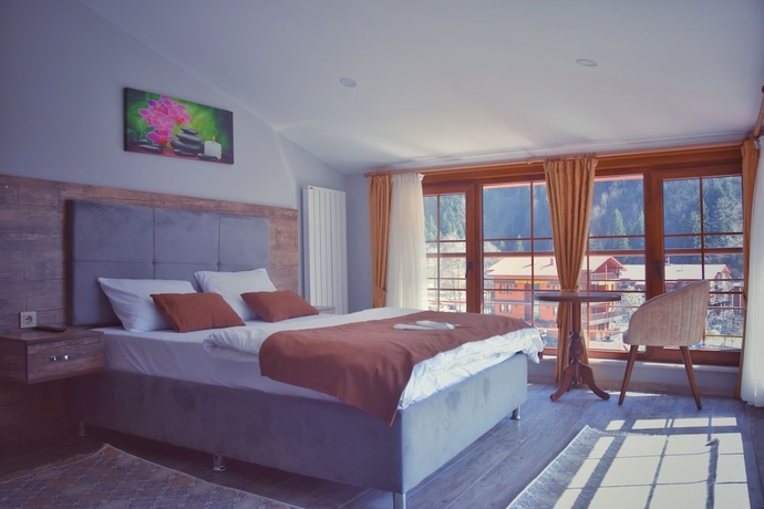 Imagen de la habitación del Huzur Otel. Foto 19