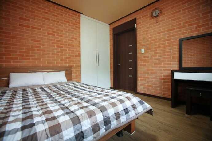 Imagen de la habitación del Hwangto-green Village. Foto 13