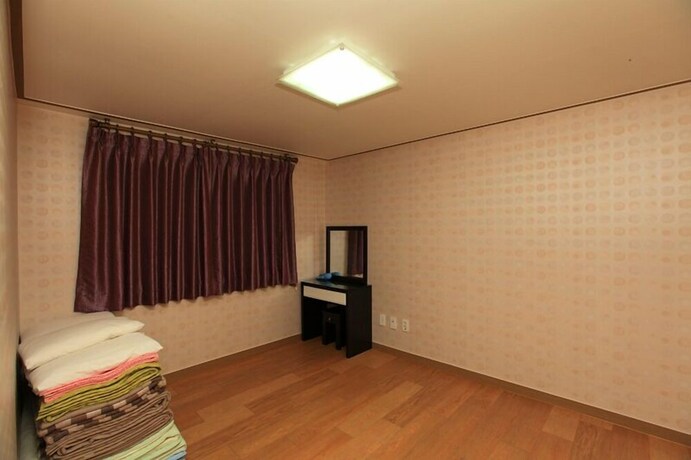 Imagen de la habitación del Hwangto-green Village. Foto 14