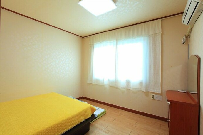 Imagen de la habitación del Hwangto-green Village. Foto 15