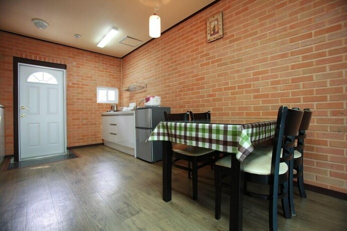 Imagen de la habitación del Hwangto-green Village. Foto 17