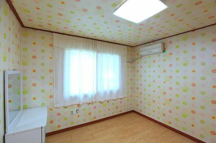 Imagen de la habitación del Hwangto-green Village. Foto 19
