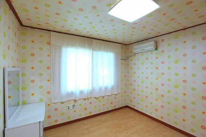 Imagen de la habitación del Hwangto-green Village. Foto 28