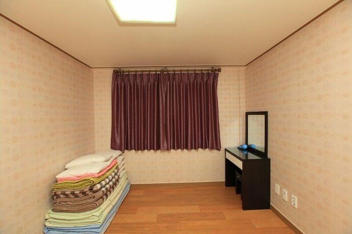 Imagen de la habitación del Hwangto-green Village. Foto 31