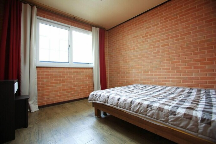 Imagen de la habitación del Hwangto-green Village. Foto 34