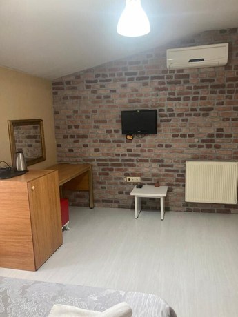 Imagen de la habitación del Hypatia Apart Hotel. Foto 4
