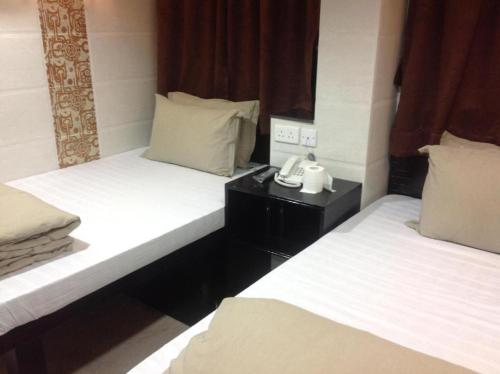 Imagen de la habitación del ILoilo Guest House. Foto 8