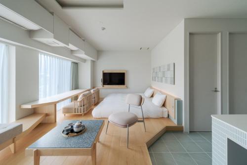 Imagen de la habitación del ITOMACHI Hotel 0. Foto 13