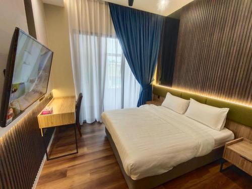 Imagen de la habitación del I-VISTA HOTEL. Foto 18