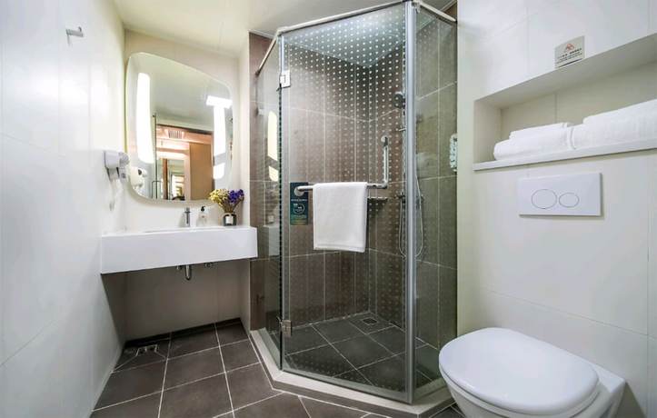 Imagen del bar/restaurante del Ibis E'meishan Railway Station Hotel. Foto 4