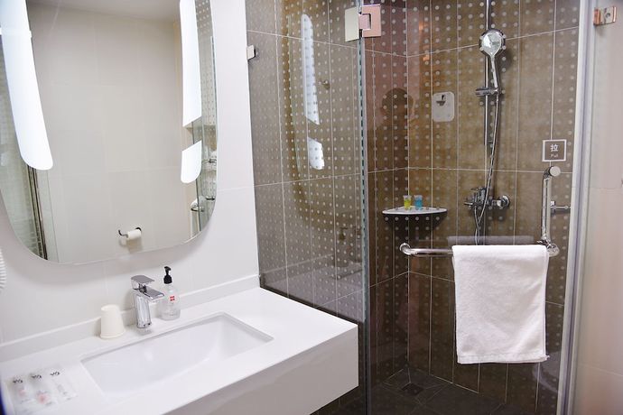 Imagen de la habitación del Ibis E'meishan Railway Station Hotel. Foto 7